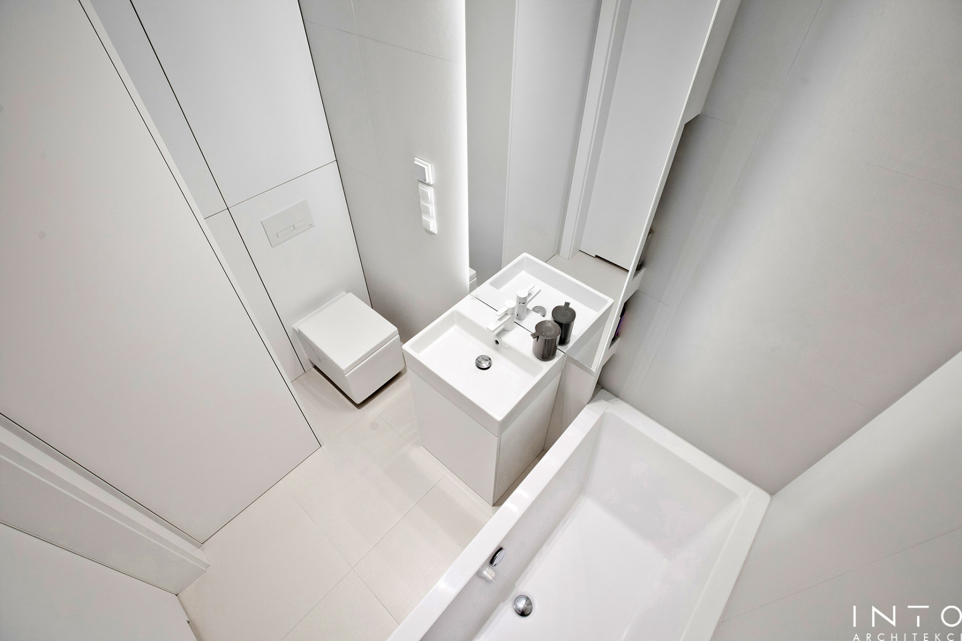 Minimalistyczny projekt wnętrza mieszkania 54 m² w Poznaniu